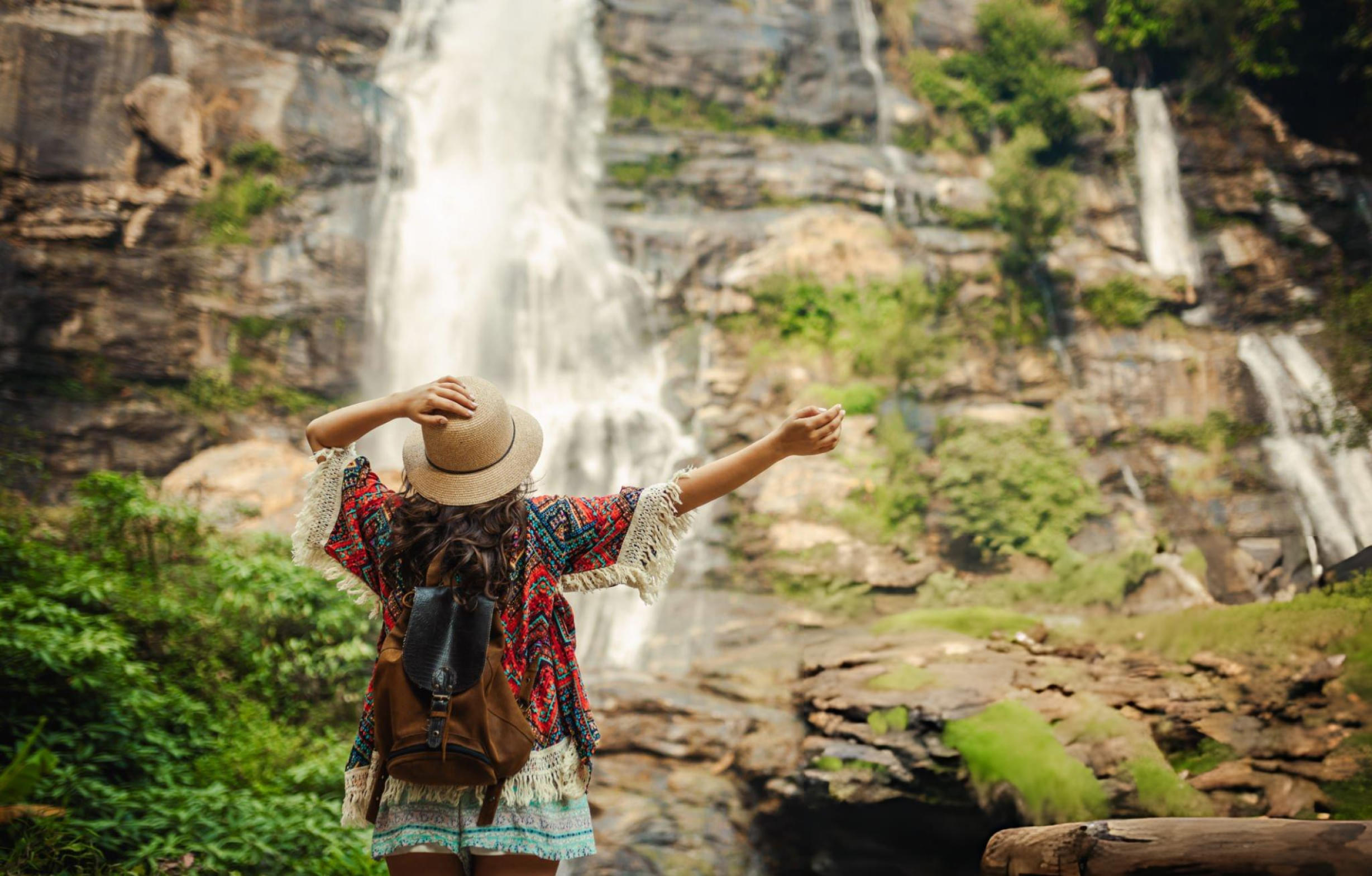 Girl admiring the stunning Ramboda Falls