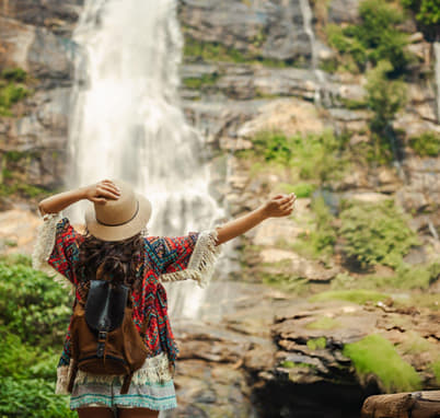 Girl admiring the stunning Ramboda Falls