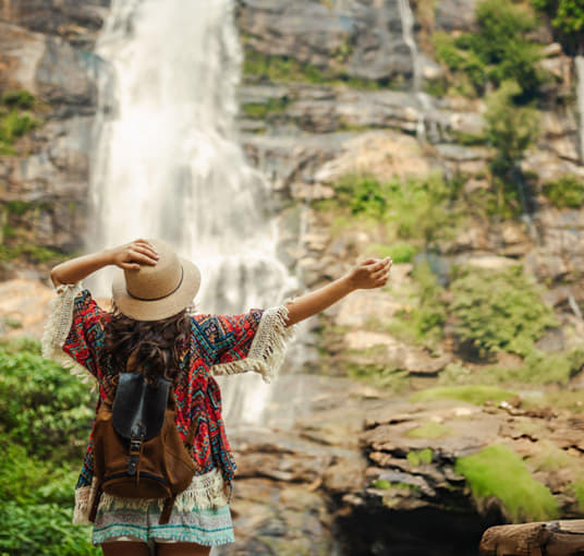 Girl admiring the stunning Ramboda Falls