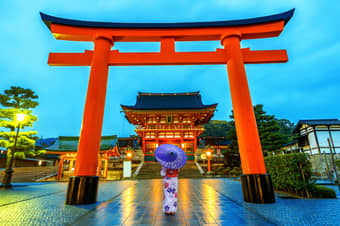 Visit Fushimi Inari Shrine, dedicated to Inari, the god of rice, prosperity & business. 