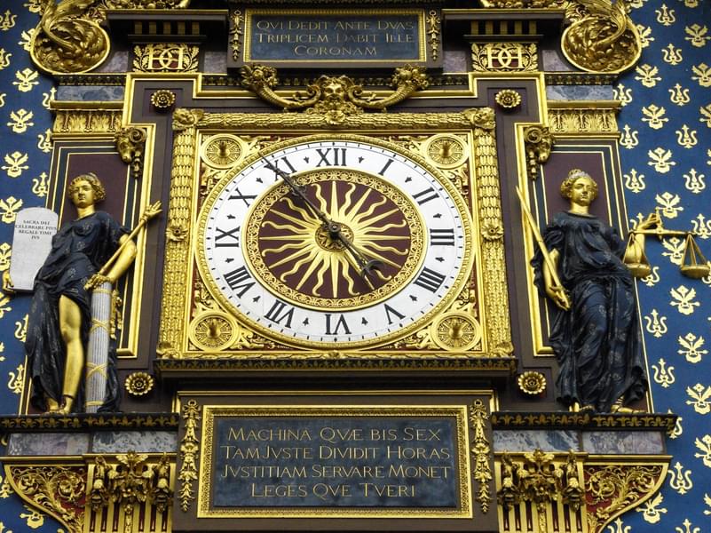 You will see the Gilded Conciergerie clock on the Clock Tower of the Conciergerie in Paris