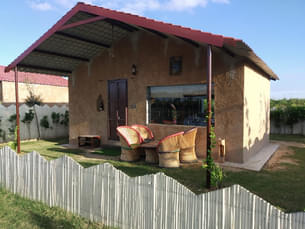 Marvel at the stunning architecture of the house in Yaduvanshi Farm