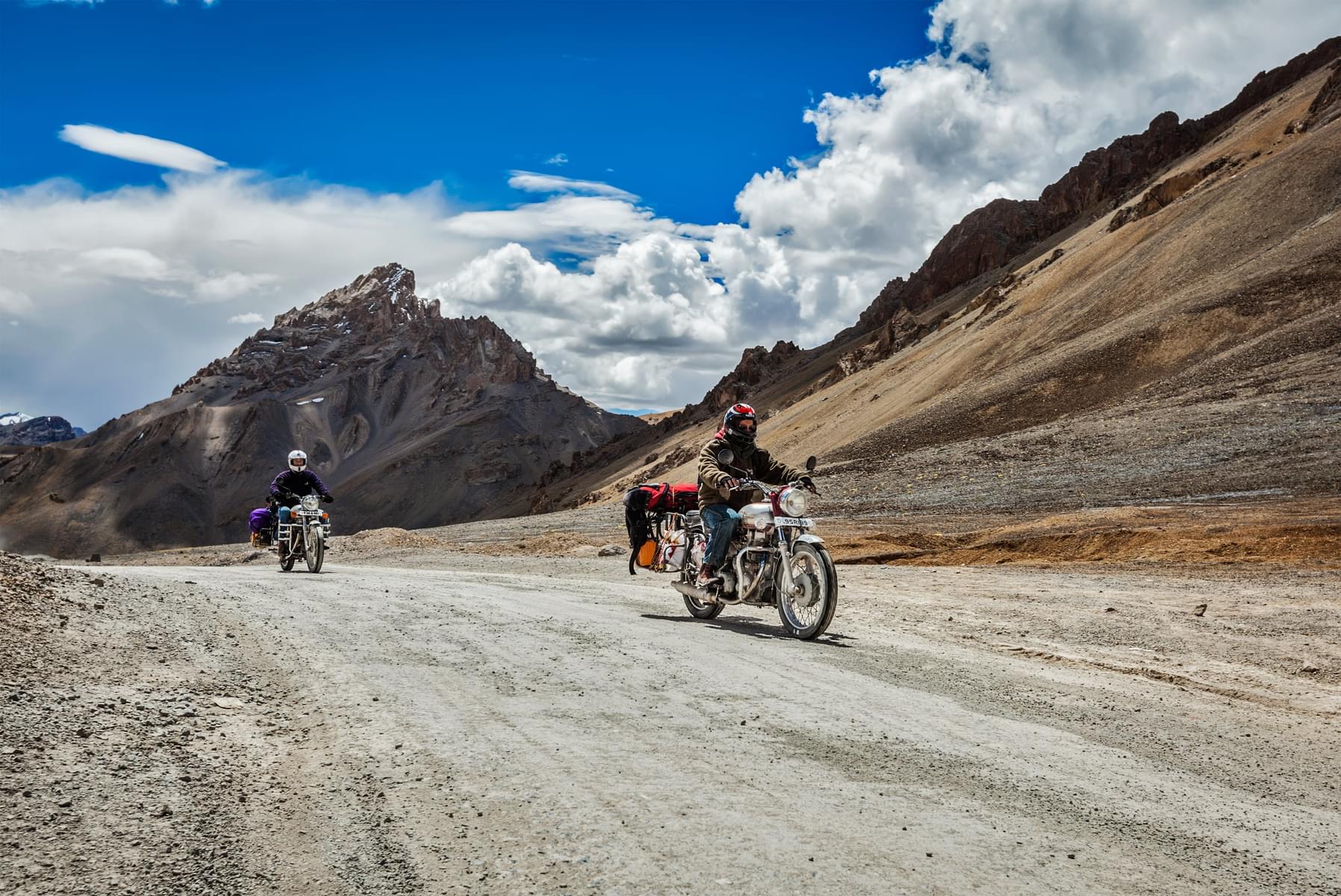 Experience the thrill of riding on some of the most difficult terrains in Ladakh with a bike.