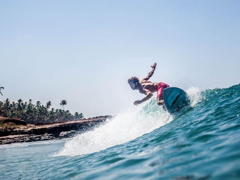 Surfing at Kuta Beach, Bali Image