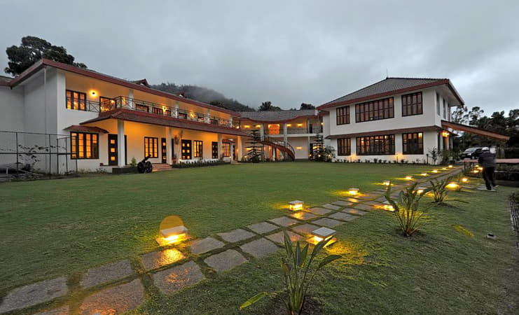 Exterior view of the resort with lights