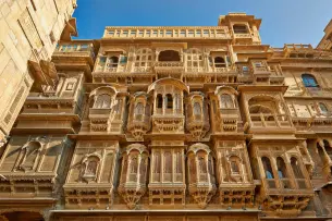 Stop by the stunning Patwon Ki Haveli, admiring its intricate carvings