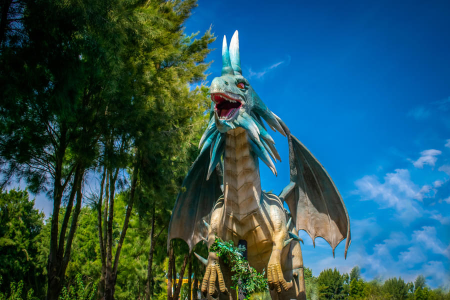 Angry blue dragon model in the park