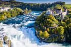 Witness the powerful cascade of Rhine Falls on a boat ride
