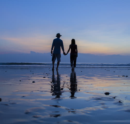 Couple enjoying the scenic view, Kerala
