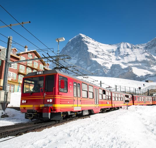 Ride the Jungfraujoch train to Europe’s highest railway station, surrounded by snow-capped Alpine peaks