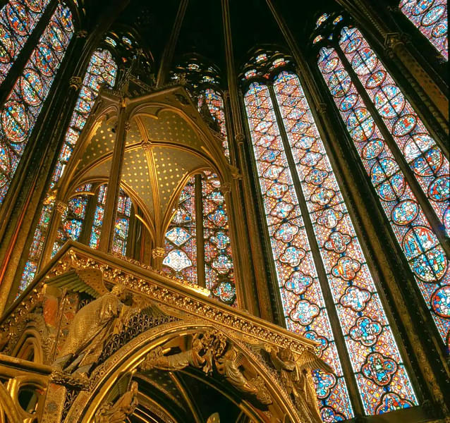 Admire the stunning crown of thorns at the Sainte Chapelle