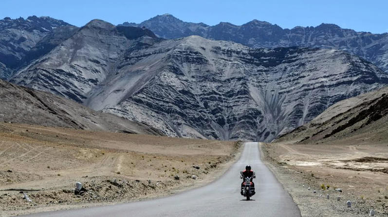 Immerse yourself in the mesmerizing view of Ladakh valley as enjoy the bike ride 