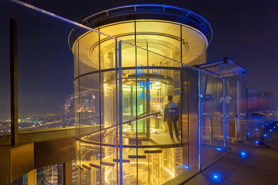 Capture the scenic view of the skywalk and the city