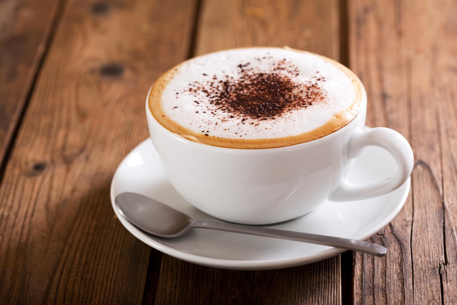 Have a cup of aromatic cappuccino coffee