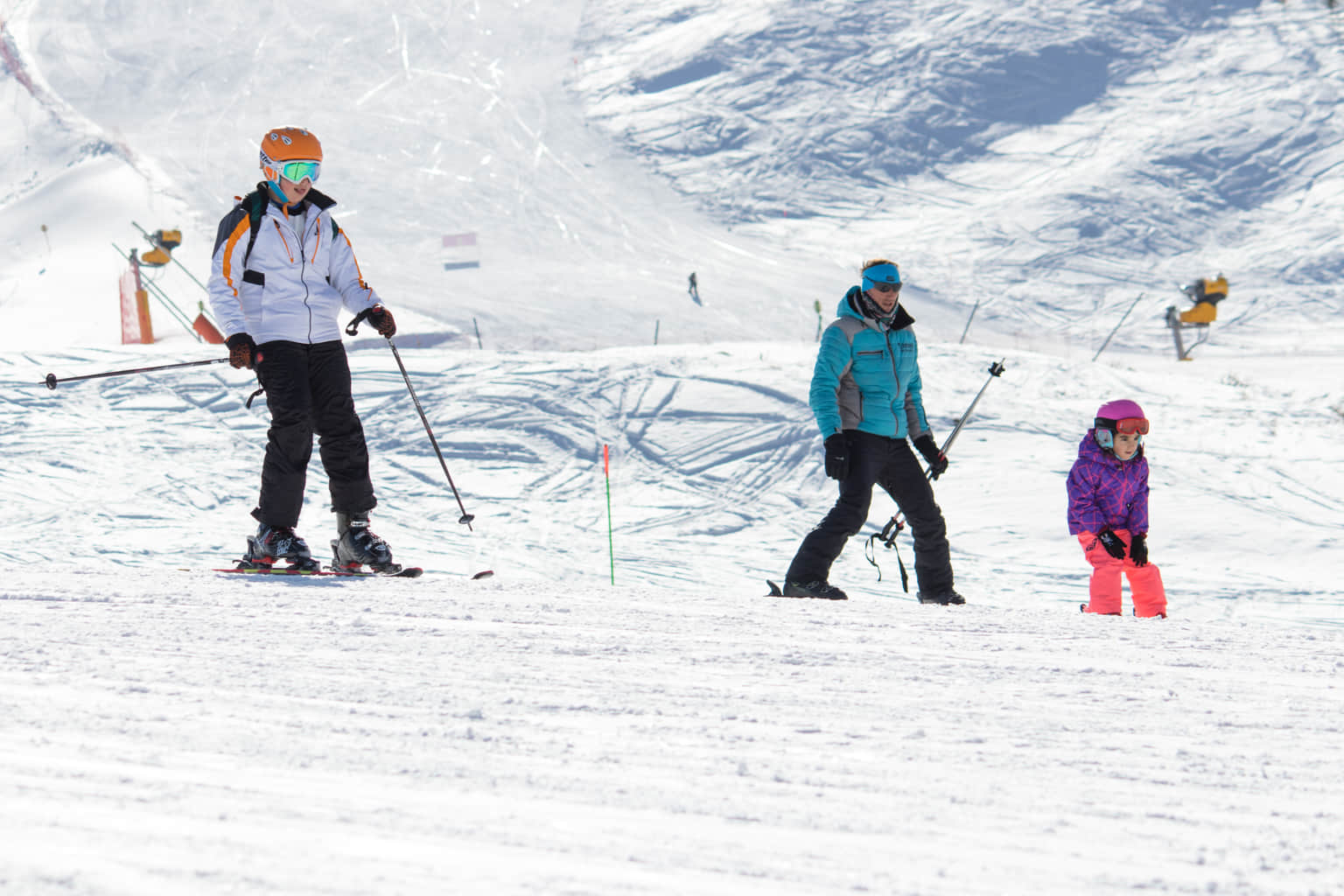 Skiers enjoying a snowy slope at a winter resort in Azerbaijan.