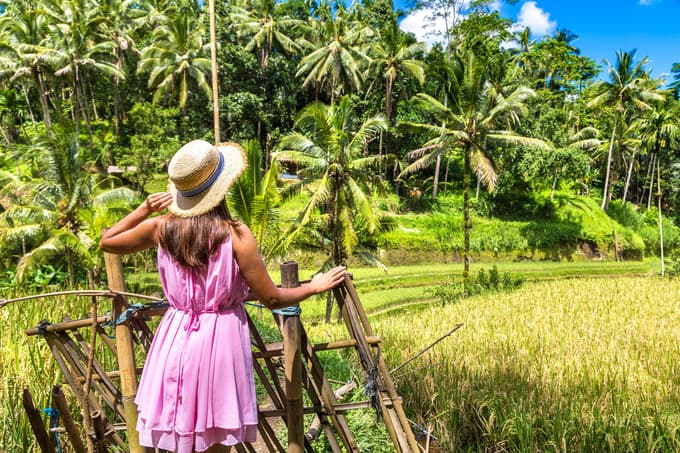 Wander through the lush green Tegalalang Rice Terrace