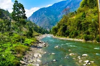 Stay overnight in riverside huts