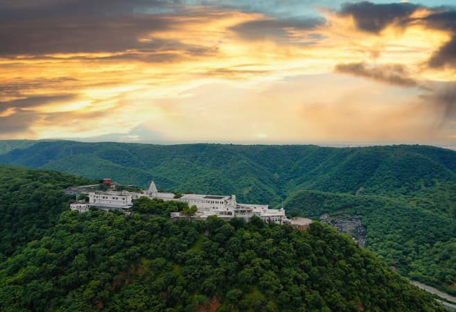 Enjoy breathtaking views of Choolgiri Hills from the temple located on the hilltop