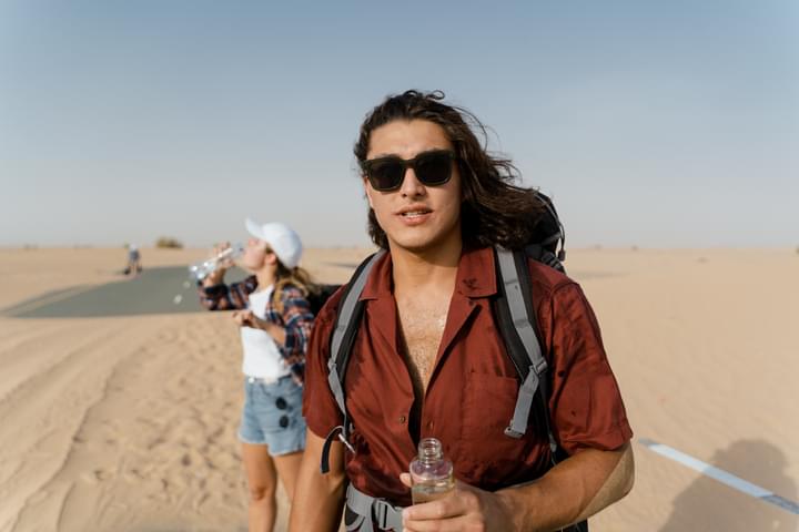 Girl Wearing Sunglasses in Dubai Desert