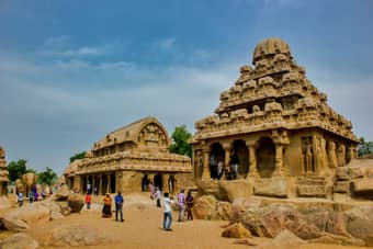 Tourist admiring the archtecture of the Shore temple in Mahabalipuram