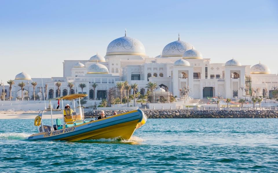 Enjoy fascinating views of Abu Dhabi while you relax on your yellow boat.