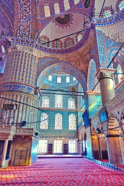 Admire the majestic architecture of the Mosque.