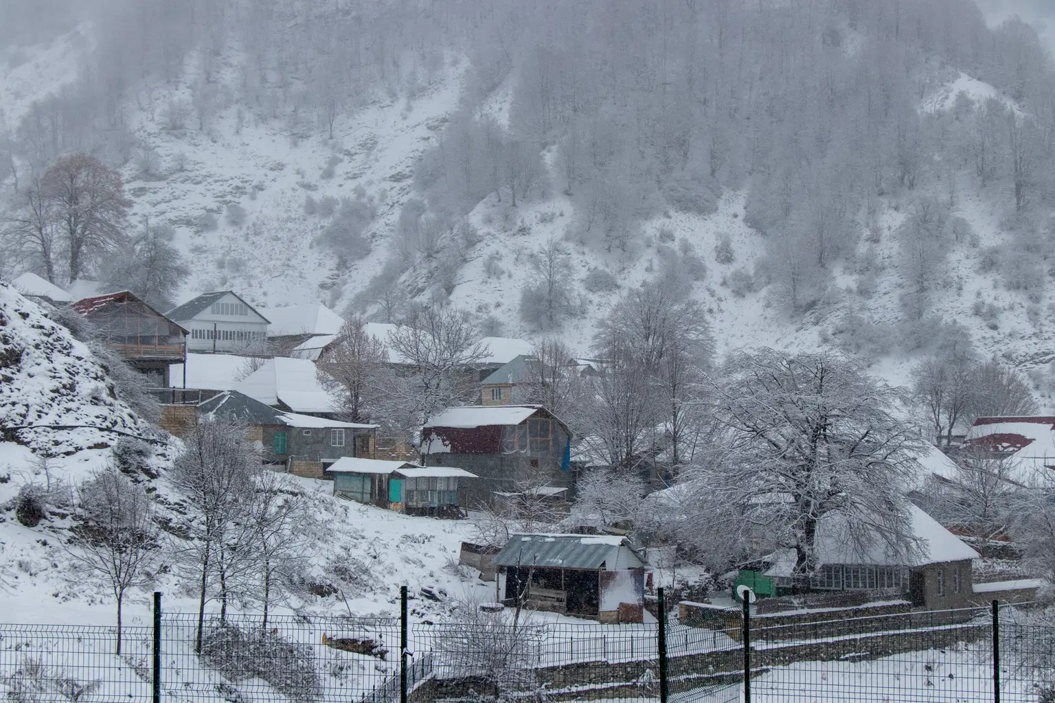 Snow-covered village in the mountains of Azerbaijan.