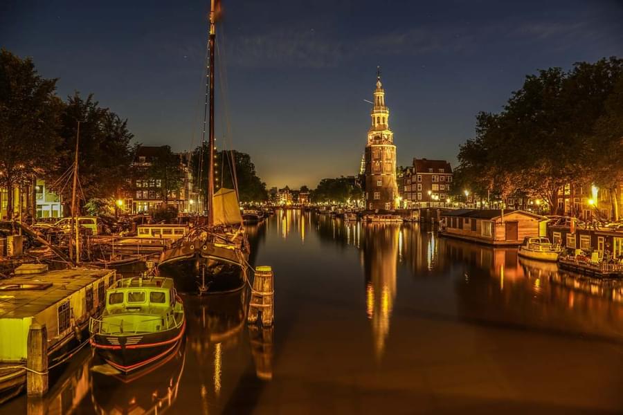 Capture the glittery night of Amsterdam from your cruise