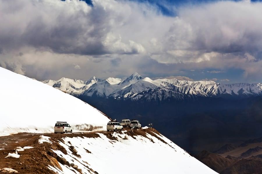 Admire the picturesque and pristine landscapes of Ladakh as you drive through the snow capped mountains. 