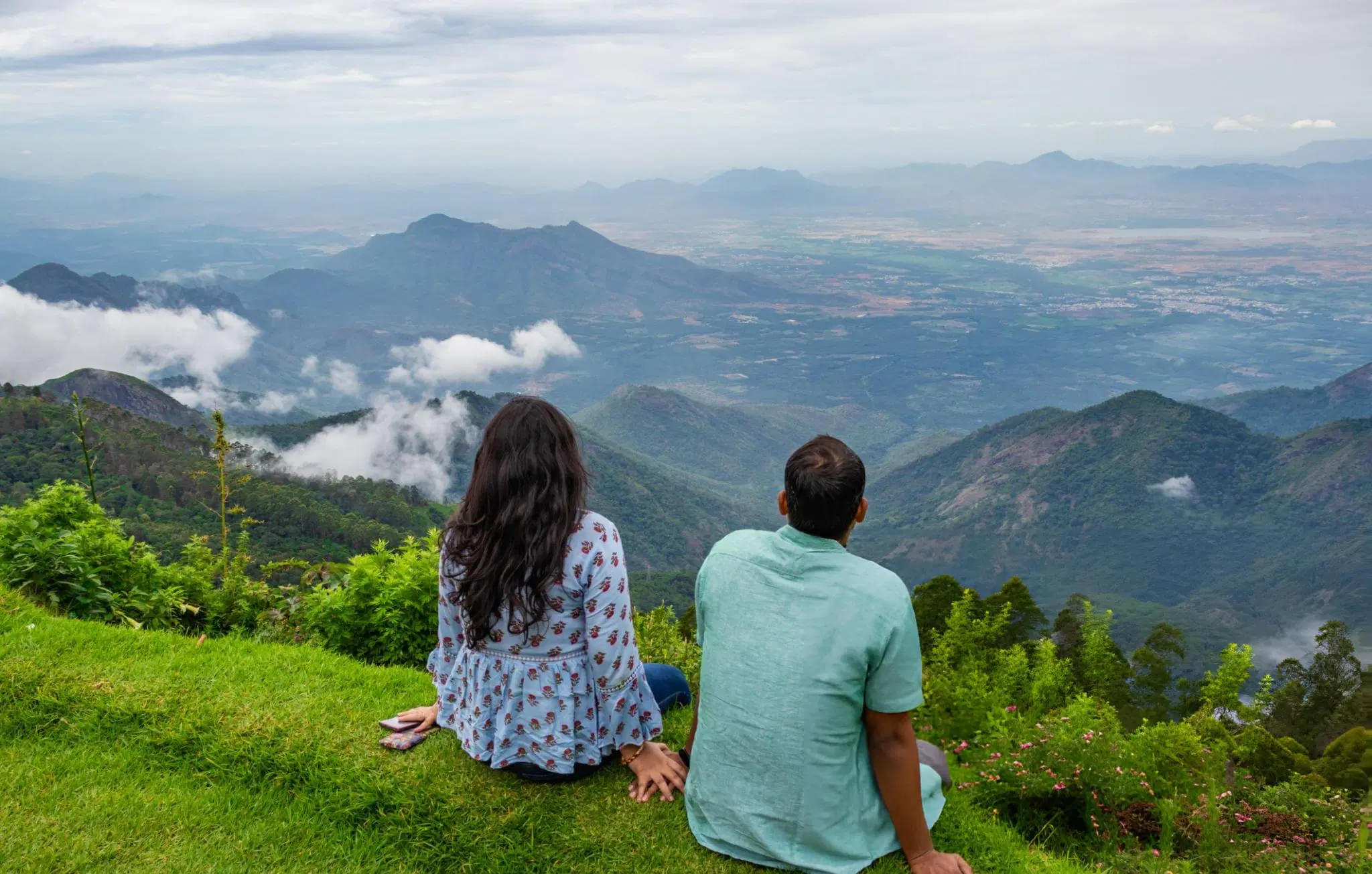 Couple admiring views from Chikmagalaur hill top