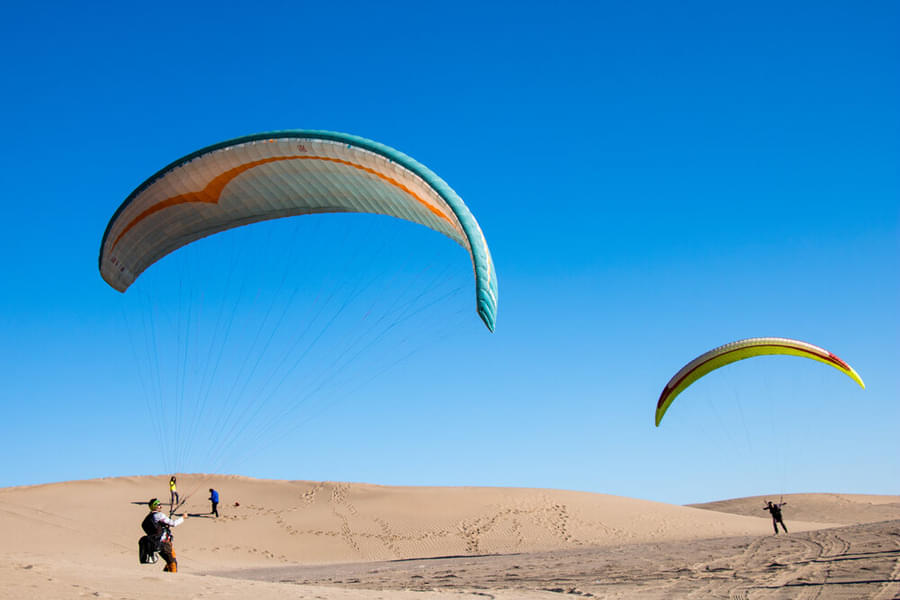 Feel the wind beneath your wings while paragliding in the skies of Dubai