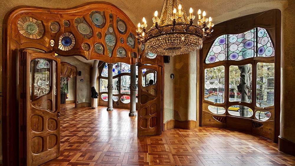 Admire the intricate interior of Casa Mila