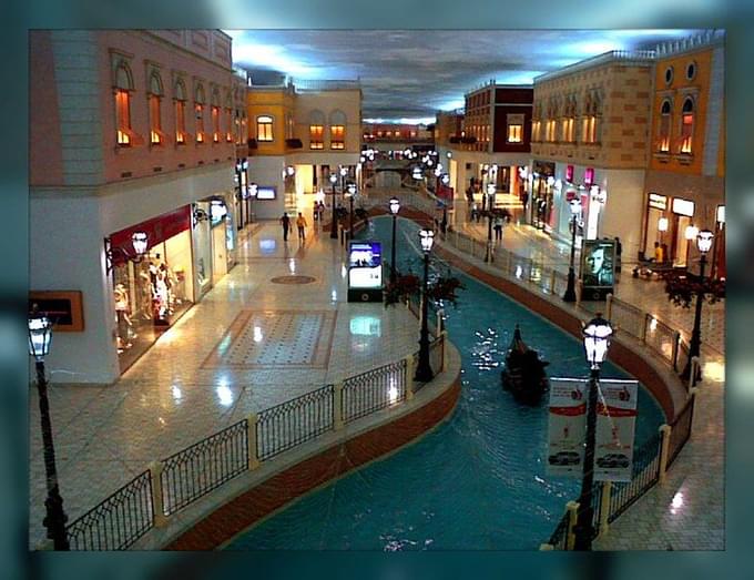 Ride a gondola at Villaggio Mall