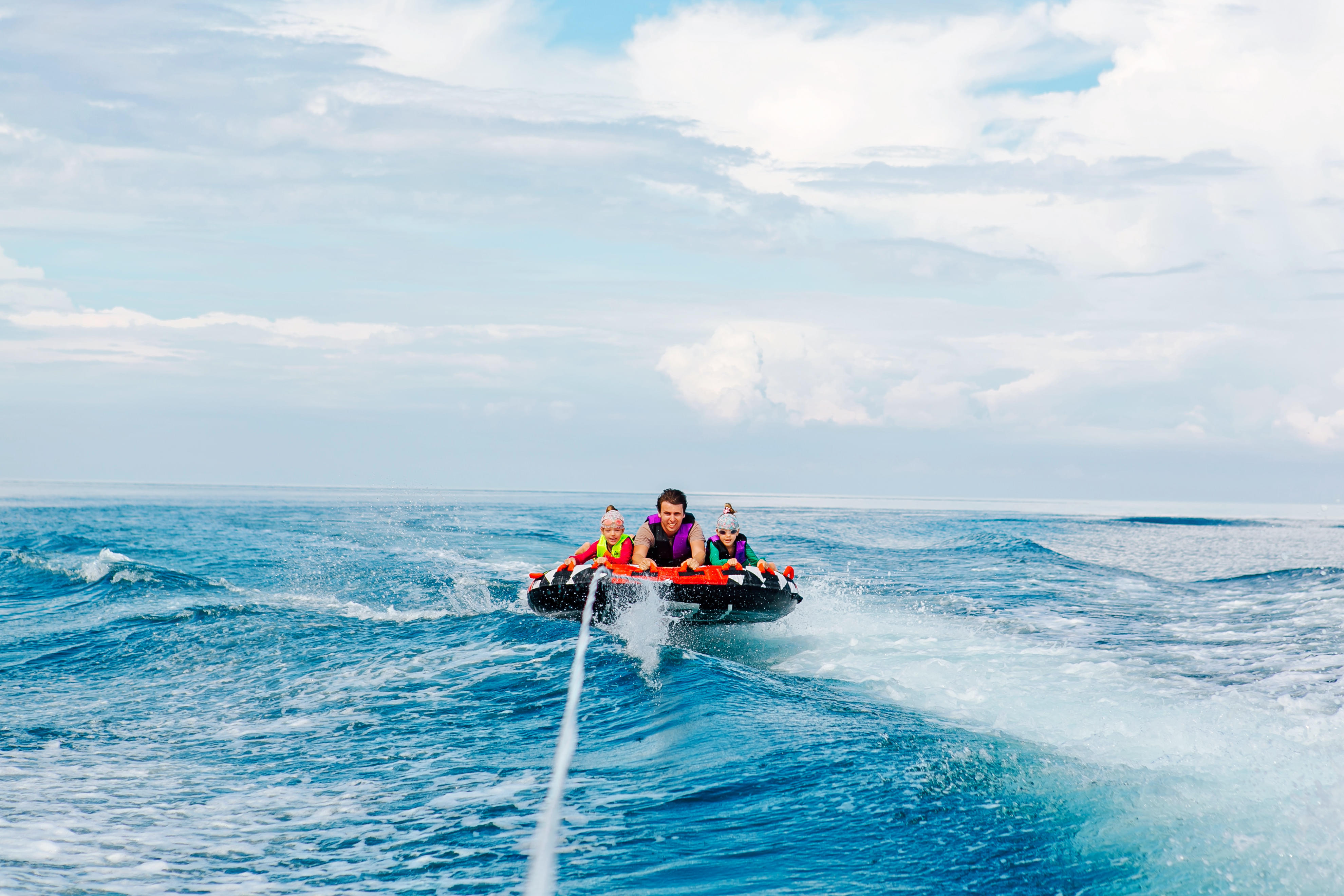 Family water sport adventure on the sea