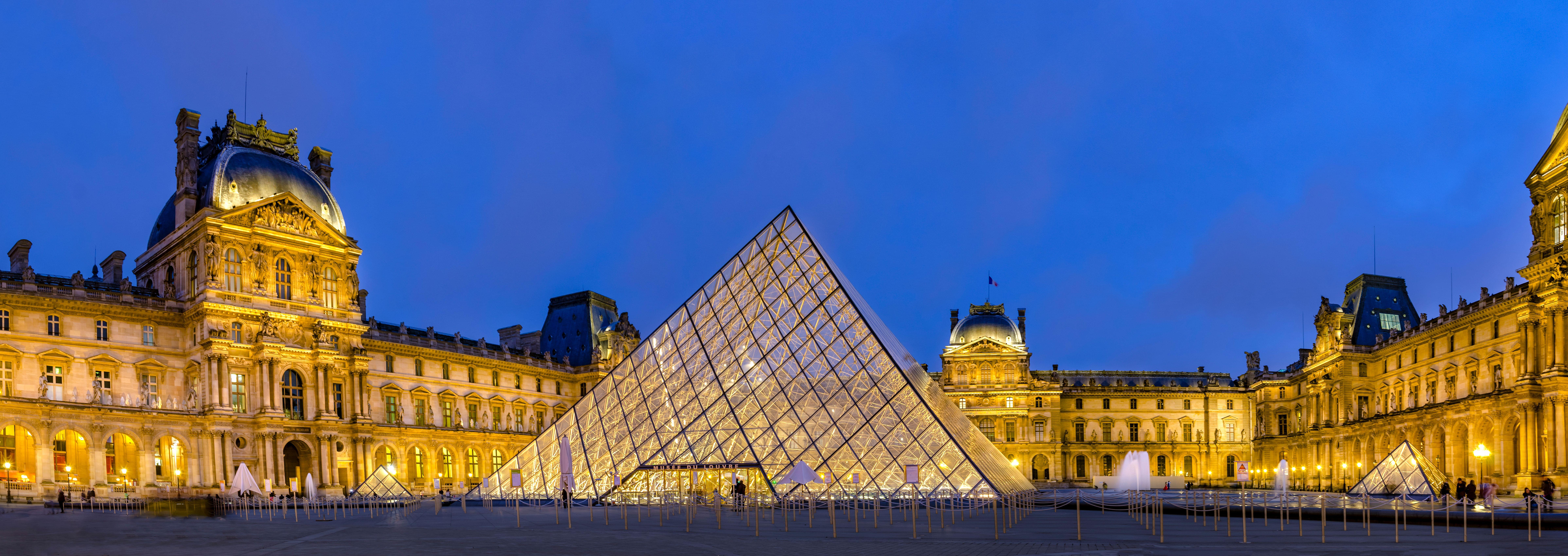 Louvre Museum Paris at Night near Eiffel Tower