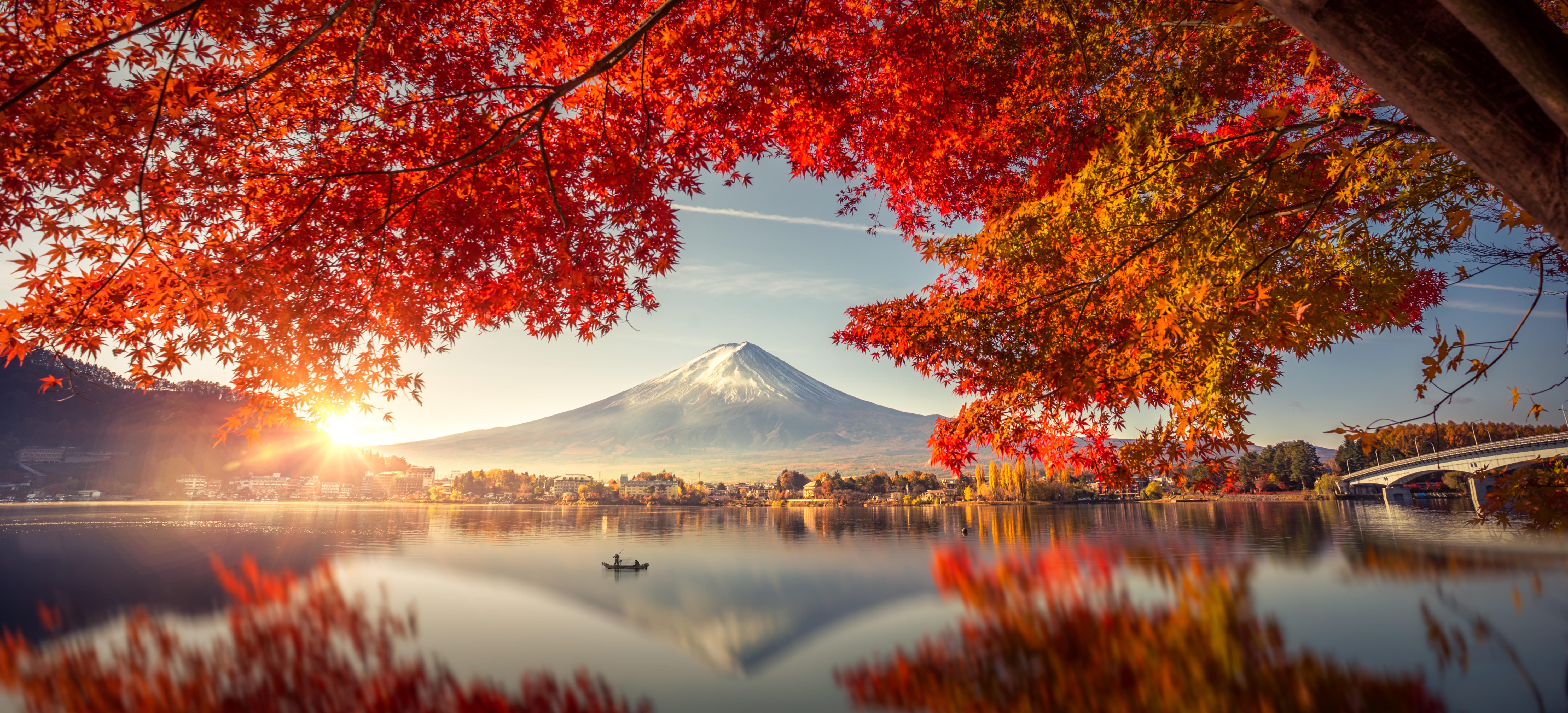 Mount Fuji framed by autumn leaves – a dreamy stop on Japan holiday tours