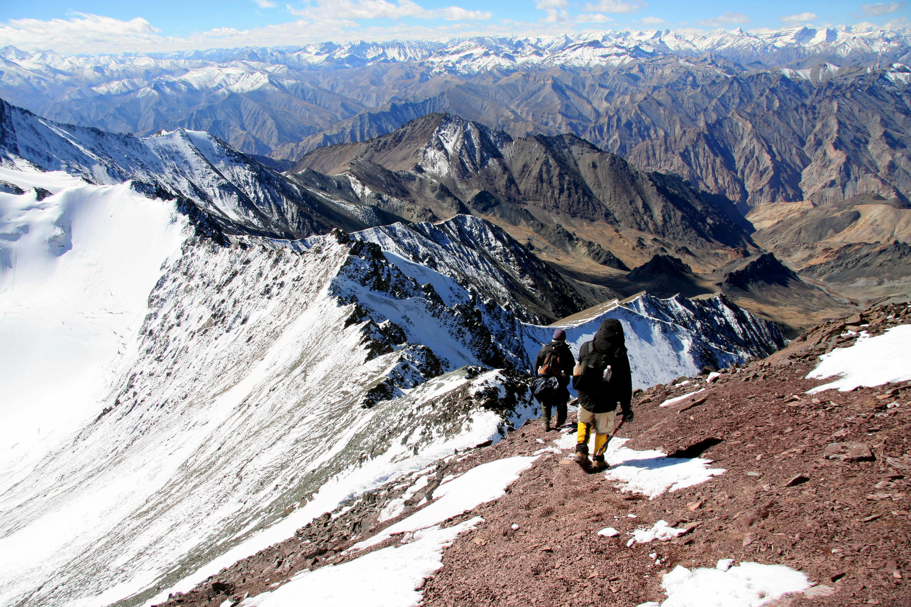 Hike through the narrow ridgeline and valleys while making your way to the summit