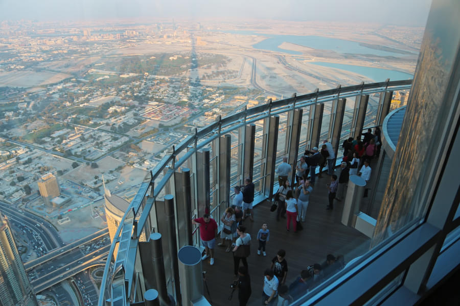 Admire panoramic views from the 124th floor's observation deck