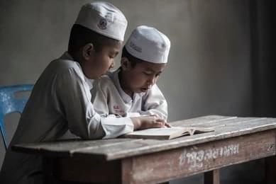 Explore the mosque's madrasas and libraries
