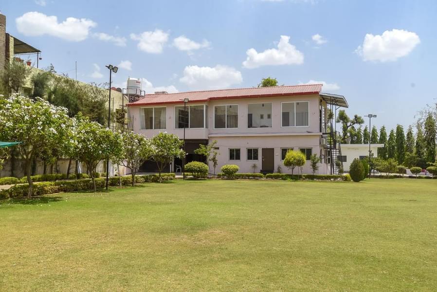 A Vacation Retreat Amidst Lush Greenery In Udaipur Image