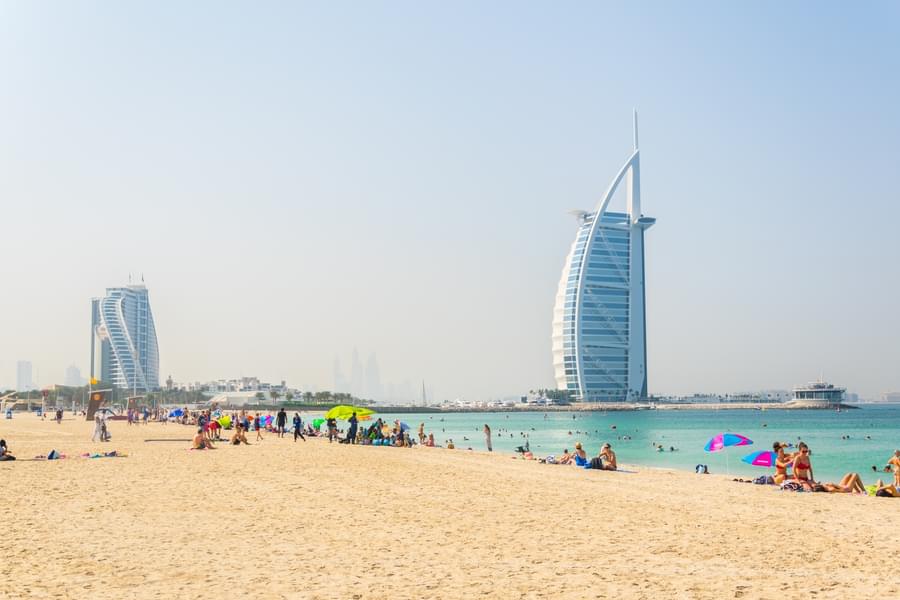 Spend an amazing time at the open beach nearby the iconic Burj Al Arab