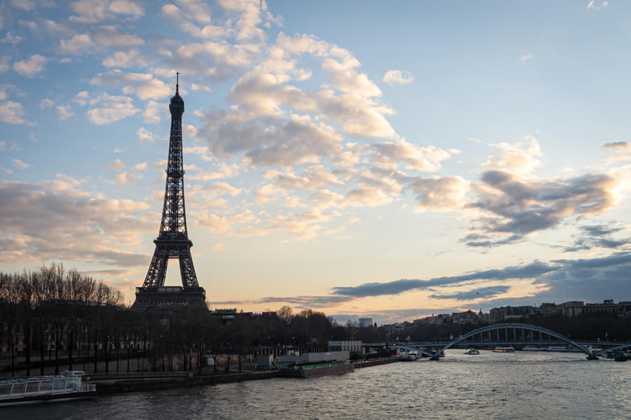 Admire the magnificent structure of the Eiffel Tower  