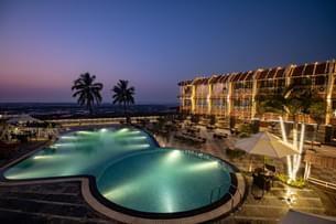 Night view of the resort with outdoor swimming pool