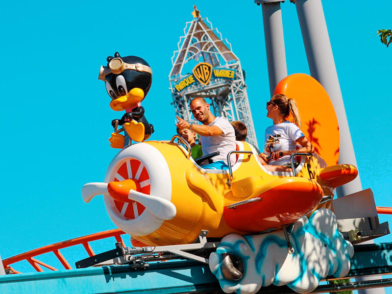 Ride along with your kids at the Cartoon Village zone of Parque Madrid