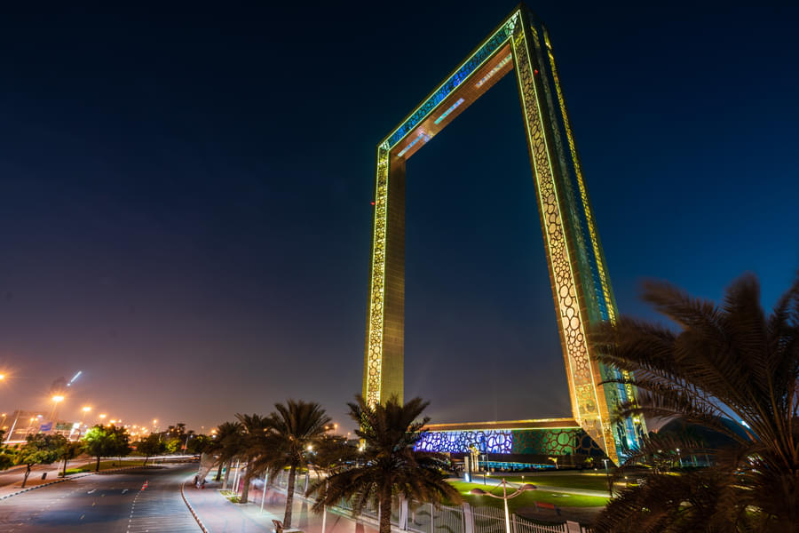 Go to Dubai Frame at night for stunning views of the glimmering city