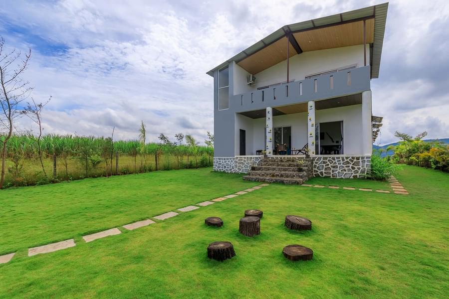 A Lakeside Villa amidst Lush Greenery in Kamshet Image