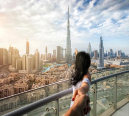 Woman admiring views of Dubai skyline