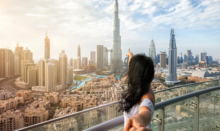 Woman admiring views of Dubai skyline