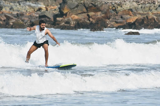 Water Surfing in Goa at Mandrem Beach Image