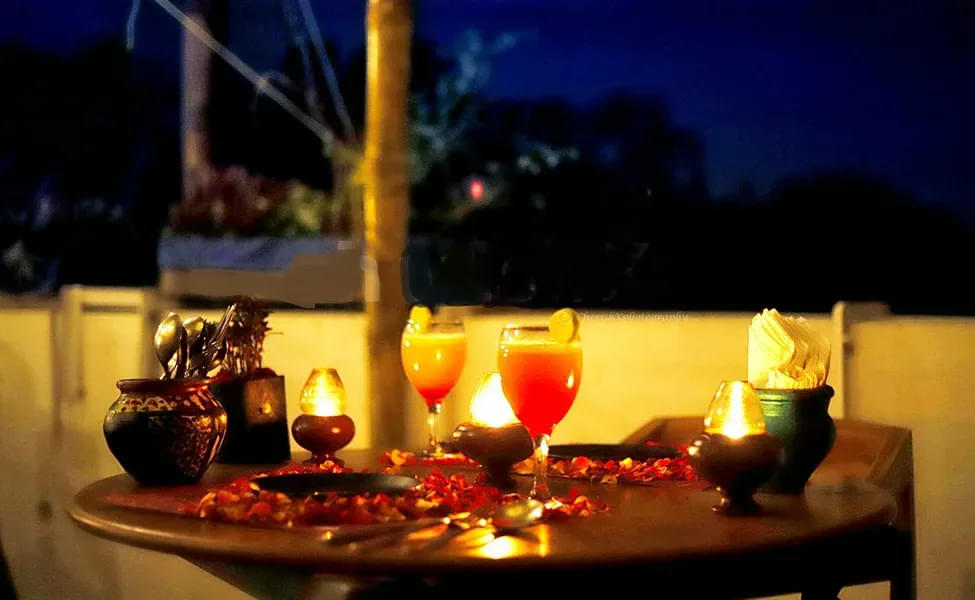 Romantic Rooftop Candlelight Dining Experience in Jaipur Image